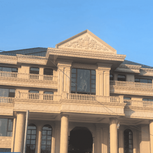 云南黄金麻别墅外墙干挂石材效果示例