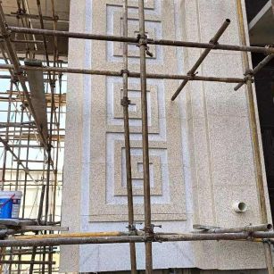 云南 黄金麻花岗岩别墅外墙干挂回纹造型效果